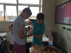 Two year 8 boys pouring smoothies that "tasted like dissapointment".